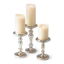 These mercury glass style votive holders are frosted on the outside, giving a matte look, and come in sets of 6. Mercury Glass Pillar Candle Holders Set Of Three Frontgate