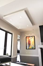 Floating Ceiling Adds Dimension To This Contemporary Space And Allows For Pot Light Application Chandelier In Living Room Floating Ceiling Coffered Ceiling
