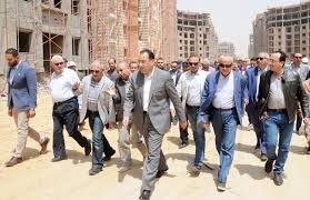 مقدمة موضوع تعبير عن العاصمة الإدارية الجديدة. Ø¨Ø§Ù„ØµÙˆØ± ÙˆØ²ÙŠØ± Ø§Ù„Ø¥Ø³ÙƒØ§Ù† ÙŠØªÙÙ‚Ø¯ Ø£ÙˆÙ„ Ø¹ÙŠÙ†Ø© ØªØ´Ø·ÙŠØ¨ ÙˆØ§Ø¬Ù‡Ø§Øª Ø¹Ù…Ø§Ø±Ø§Øª Ø§Ù„Ø¹Ø§ØµÙ…Ø© Ø§Ù„Ø¥Ø¯Ø§Ø±ÙŠØ© Ø§Ù„Ø¬Ø¯ÙŠØ¯Ø© Ø¨ÙˆØ§Ø¨Ø© Ø§Ù„Ø£Ù‡Ø±Ø§Ù…