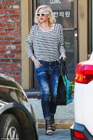 The most common kurt cobain jeans material is plastic. Gwen Stefani Pays Homage To Kurt Cobain Again In Ripped Jeans And Striped Shirt Daily Mail Online