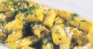 Khandvi Vegetarian Recipe By Master Chef Sanjeev Kapoor Spicy Recipes Recipes Vegetarian Recipes