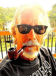 Enjoying pipe and scotch