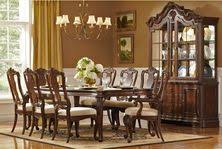 Measure the dining room set from wall to wall and notes the measurements. Fi8i3desqlgmjm
