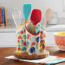 After a lot of research, i went with this pioneer woman spatula. The Pioneer Woman Floral Medley 3 Compartment Utensil Holder Walmart Com Walmart Com