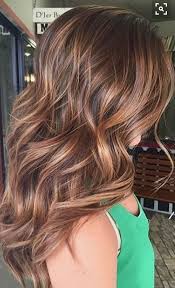 With these stunning cascading ribbons of color. Auburn Balayage