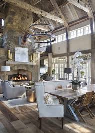 With 30 Foot Ceilings And A Massive Central Fireplace Teresa Had Difficulty Finding A Ceiling Fixture That Could Stan House Interior Rustic House House Design