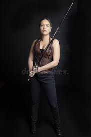Download 950 background foto wisuda anak tk gratis terbaik. Young Woman In Urban Fantasy Poses On A Black Background Stock Image Image Of Plain Jeans 157440331