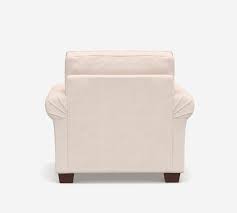 Front legs include casters for easy mobility. Pb Comfort Roll Arm Upholstered Armchair Pottery Barn