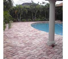 Carvestone is such a durable and adaptable material that it can be applied with equal success in high stress and high visibility locations: Herringbone Pattern Brick Paver Pool Decking Done By Thepavinmaven Com Brick Courtyard Pool Pavers Backyard Pool