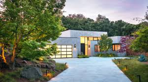 Understated and elegant, and at once suggestive of the provincial estate, a gravel driveway softens the harshness of industrial influences, which are often inevitable where modern home construction is concerned. Fantastic Driveway Designs For Curb Appeal Sunset Magazine