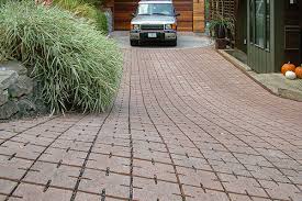 Driveways are one of the most used areas of your house, often overlooked until they stain or crack. What Are Permeable Pavers And How Do They Help With Water