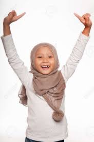 Prepositions in, on, at a worksheet to practise prepositions of time (in, on, at). A Malay Little Girl Wearing Head Scarf And Raising Her Both Hands Stock Photo Picture And Royalty Free Image Image 18411601