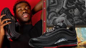 Lil nas has been hyping the customized nike air max 97 shoes which feature the pentagram symbol, a bible verse that references. Nike Sues The Maker Of Lil Nas X Satan Shoes For Trademark Infringement Creators Empire