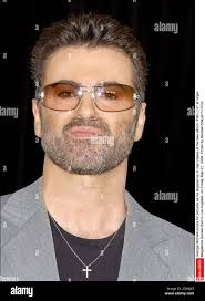 George Michael poses for pictures as he stopped by to sign copies of his  new album Patience at Virgin Megastore Sunset Blvd in Los Angeles,