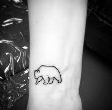 This tattoo is a true natural design that fits nicely on the inner arm. Birds Wrist Tattoo Wrist Simple Tattoos Simple Tattoos Momcanvas In 2021 Bear Tattoo Designs Simple Wrist Tattoos Simple Tattoos