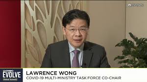 Yes, this minister doesn't just look smart, he has the papers to back it up. Singapore Finance Minister Lawrence Wong On Air Travel Covid Outbreak