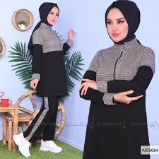 Yarim Fermuar Detayli Olan Vizon Renkli Tunik Yeni Sezondur Gogus Ve Kol Ucunda Kare Desen Bulunduran Tunik Oldukca Modern Bir Gorunu Moda Stilleri Moda Tunik