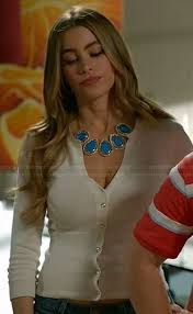 Sofia vergara defends her character on modern family. Gloria S White V Neck Cardigan And Blue Necklace On Modern Family Modern Family Sofia Vergara Modern Family Sofia Sofia Vergara Style