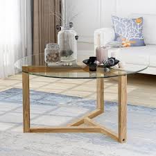 Golden leaf round base coffee table is an ideal material for those who need a durable surface for entertaining. Magic Home 35 43 In L Oak Color Round Tempered Glass Top Coffee Table With Sturdy Wood Base Cs Wf190112aal The Home Depot