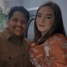 Who can repair a glass door connection to a wood frame?