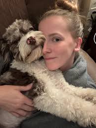 When you want to go outside, but daddy's watering the lawn and you don't  like getting wet. (He swims in rivers and lakes, will sit in the rain, but  hates pools and