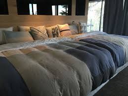 Co Sleeping We Made Our Own Giant Co Sleeping Bed Out Of Two King Sized Mattresses And Bases Without Feet To Make It Lo Cosleeping Bed Big Beds Sleeping Room