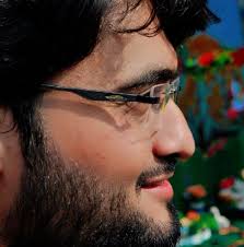 Why can certain mountain ranges be seen from hundreds of miles away if the  Earth is spherical?