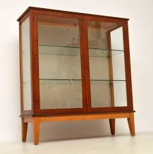 ↑cabinet * * * noun see china closet … 1960 S Teak Vintage Bookcase Display Cabinet Retrospective Interiors Retro Furniture Vintage Mid Century Furniture Vintage Danish Modern Furniture Antique Furniture London