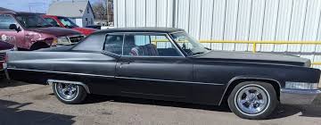 Image result for Black 1969 Cadillac
