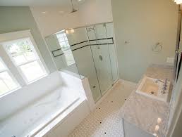 Master Bathroom Suite With Subway Tile Shower Jacuzzi Tub Marble Countertops And Ceramic Mosaic Bathroom Design Luxury Master Bathroom Design Bathroom Design