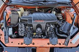 Image result for Sunburst Orange 2004 Pontiac