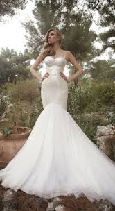 These modern mermaid styles are sleek, slimming, sophisticated and polished. Embroidered White Silk Spaghetti Strap Mermaid Wedding Dress Modwedding Wedding Dresses Mermaid Wedding Dress Gorgeous Wedding Dress