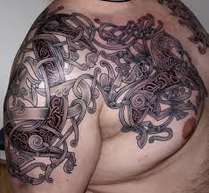 In these pieces, animals and plants mingle together. Grey Scandinavian Tattoo On Right Shoulder And Chest By Darksuntattoo