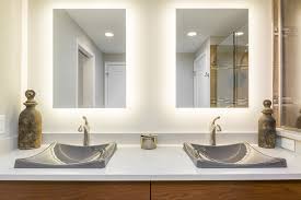 A glass pendant is the perfect bathroom lighting, plus is a nice way to add subtle drama and the diffused light effect will visually enhance the space, drawing attention to the interesting shapes rather than to the size of the room. Master Suite Bathroom Lighting Ideas For A Home Remodel Forward Design Build Remodel