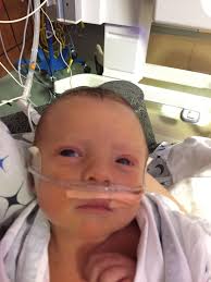 Saginaw's first baby born in 2017 came early for Bay County parents