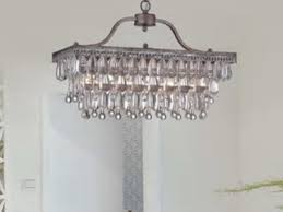 Feminine details in a rustic patina rustic and strong this chandelier is a perfect marriage of old and new world styles. Flowering Lotus Pendant By Jamie Young Co Ksl Com