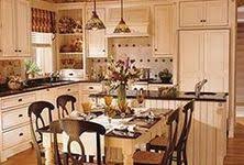 The room has purple walls and dim lighting from the chandelier and recessed lights. 120 Kitchen Island Table Combinations Ideas Kitchen Island Table Kitchen Design Kitchen Island Table Combination
