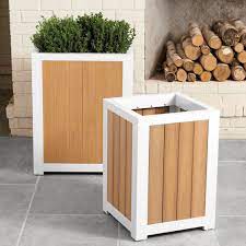 Designer Suzanne Kasler S New Transitional Style Planters Are The Perfect Accent In Any E Diy Outdoor Planter Boxes Diy Planters Outdoor Outdoor Planter Boxes