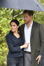 Britain's prince harry and his wife meghan, the duke and duchess of sussex, are pictured in this undated handout photo supplied to reuters one saw the move as somewhat hypocritical. Harry And Megan Share A Umbrella From The Heavy Rain Prince Harry And Megan Prince Harry Meghan Markle Prince Harry