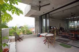 | once your plants are fully grown, this cascading flower planter will look like a beautiful bush in your garden. This Cascading Planter Box House In Kuala Lumpur Celebrates Sustainable Living Ignant