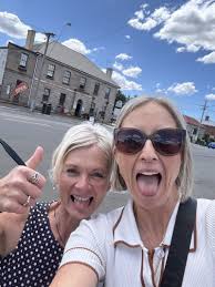 Two exhausted but elated Education Consultants—fuelled by passion…