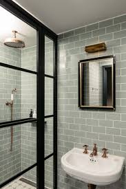 I've found with the swinging glass half walls, if you position them slightly inside the edge of the bathtub instead of right over the edge where a us shower door would. The Slow Disappearance Of Hotel Bathroom Shower Doors Conde Nast Traveler