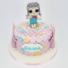 This cake idea can be a fun twist on a tradicional cake. Lol Doll Mermaid Cake