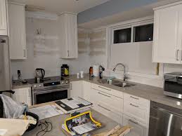 White quartz countertops with white cabinets. Need Help With Backsplash Hazelwood Quartz Countertops Off White Cabinets Open Concept Room Which The Walls Are A Blue Grey Type Of Colour Was Thinking White Subway Tile With Hints Of Grey In