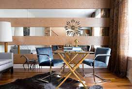 I would do two pieces that are appropriately sized and related to each other thematically and in colorway. 10 Rooms With A Mirrored Wall