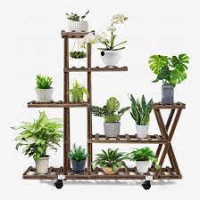 This outdoor plant stand is quite unusual as it is quite literally a wood this beautiful periwinkle plant stand was made using stacked large clay pots and a matching tray. 30 Best Plant Stands 2021 The Strategist