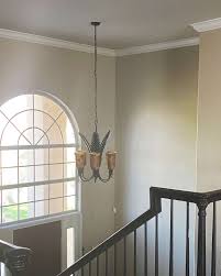 To change light fixture in 2 story foyer. How To Decorate A Tall 2 Story Wall More Tall Wall Dilemmas Designed