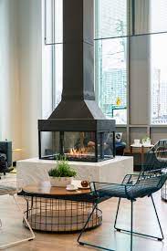 Open fireplaces can usually be found with damper located within the upper part of the firebox. 7 Stunning Modern Gas Fireplaces In Commercial Spa European Home Medien Fotos Und Videos 2 Archello