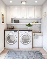 But it also reminds us to hang shelves and cabinets as high as they will go — no vertical space left behind. Unbranded Shaker Laundry Cabinet Kit With Pull Out Faucet Ql058 The Home Depot Stylish Laundry Room Laundry Room Layouts Laundry Room Renovation