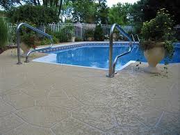 A Stamped Overlay And Spray Texture Are Decorative Pool Deck Repair Options That Offer A Broad Range Of Patterns And Colors T Concrete Pool Pool Deck Cool Deck